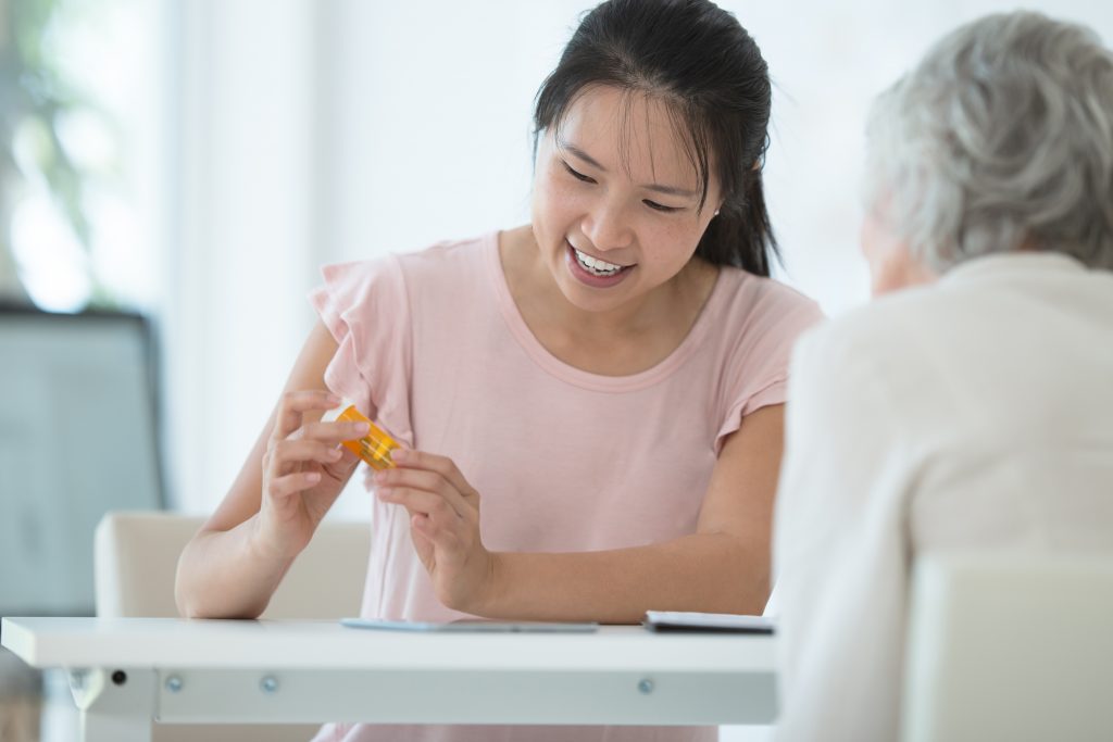 Girl checking medicins